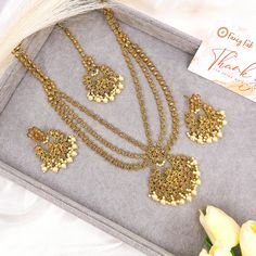 This Beautiful Antique Gold Triple Layer Long Mala Necklace  Rani Haar Set for all Vibrant colors for your special events. Set Includes: Necklace, Tikka and Earrings Dimension:- necklace:- Length 13" Earrings:- Drop Length 3" Approximately.  Jewelry Care -- Keep all the jewelry away from water, perfumes, and other harsh chemicals To clean wipe with a lint-free cloth to retain the shine Please Note- No Returns No Exchange Polki Sets, Rani Haar, Jewelry Pakistani, Ear Chain, Gold Plated Bangles, Head Chain, Polki Jewellery, Gold Long Necklace, Pakistani Jewelry