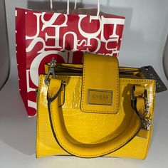 Never Use. With Tag Yellow Box Bag With Detachable Handle, Trendy Yellow Crossbody Satchel, Trendy Yellow Satchel Bag, Trendy Yellow Shoulder Bag, Yellow Rectangular Box Bag With Adjustable Strap, Trendy Yellow Satchel With Adjustable Strap, Trendy Yellow Crossbody Bag, Trendy Yellow Satchel For Daily Use, Chic Yellow Box Bag With Removable Pouch