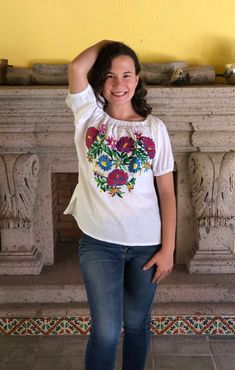 Embroidered blouses are a tradition for women of all cultures of México, with bright colors and handmade, our blouses are a must have garment. This blouse is one size and fits S/M The embroidery is unique in each blouse so it may vary Mexican textile art has centuries of history and creativity throughout the country. Mexico is recognized as one of the leading countries with a beautiful aristic production in the textile world, miraculous hands of talented artisans from different states of the cou Fitted Folk Style Embroidered Top, Festival Embroidered Multicolor Top, Embroidered Multicolor Tops, Bohemian Tops With Multicolor Resham Embroidery, Traditional Embroidered Blouse For Cinco De Mayo, Traditional Floral Embroidered Top For Spring, Embroidered Border Blouse For Spring, Multicolor Embroidered Blouse For Fiesta Festivals, Traditional Blouse With Geometric Embroidery