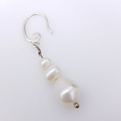 "These earrings were handmade in our shop from a broken vintage pearl necklace! Three beautiful baroque shaped white pearls on each earring! The wires and french hooks are sterling silver. Earrings measure 1.5\" in total length. Large pearls are approximately 10mm. Small pearls are approximately 4mm. US SHIPPING: US orders over $35 or for 3 or more items ship free via first class mail. Orders over $150 receive a free priority mail upgrade. Expedited shipping is available. SHIPPING OUTSIDE THE US Long Drop Pearl Earrings With Ear Wire, Pearl Dangle Earrings With French Hook, White Pearl Earrings With French Hook For Gift, White Teardrop Pearl Earrings With French Hook, White Pearl Earrings With French Hook, White Baroque Pearl Earrings With Ear Wire, Handmade White Pear-shaped Pearl Earrings, White Dangle Pearl Earrings With French Hook, Handmade White Drop Pearl Earrings