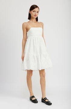 An oversized bow punctuates the back of this fanciful fit-and-flare dress that has dainty broderie details along the hem. 31" length (size medium) Ties at back Square neck Adjustable straps Lined 100% cotton Hand wash, line dry Imported Spring A-line Dress With Cutwork Hem, Spring Sleeveless Broderie Anglaise Mini Dress, Chic Sleeveless Broderie Anglaise Mini Dress, Chic Sleeveless Mini Dress With Broderie Anglaise, Spring A-line Sundress With Ruffle Hem, Summer Broderie Anglaise Mini Dress For Garden Party, Fit And Flare Dress With Flared Hem For Summer, Summer Fit And Flare Dress With Flared Hem, Chic Dresses With Cutwork Hem For Day Out