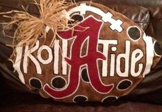 a brown leather couch with the word kohl tide painted on it's side