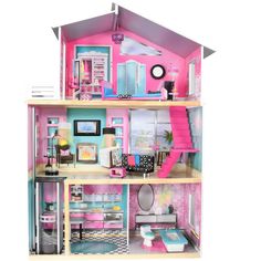 a doll house with furniture and accessories inside