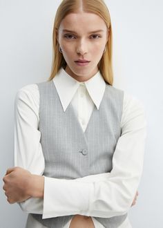 Pinstriped suit vest - Woman | MANGO USA Classic V-neck Office Vest, Tailored Pinstripe Vest For Spring, Elegant Tailored Pinstripe Vest, Formal Striped Sleeveless Vest, Pinstripe Tailored Sleeveless Vest, Tailored Pinstripe Sleeveless Vest, Tailored Sleeveless Pinstripe Vest, Pinstripe Vest For Work, Elegant Pinstripe Sleeveless Vest