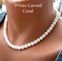 Add an elegant touch to your bridal ensemble with this stunning White Carved Coral Necklace. Crafted with 8mm white carved coral beads, this necklace exudes timeless beauty and sophistication. Perfect for wedding accessories or any special occasion, this coral bead necklace is sure to make you stand out. Handmade with care and finished with a durable steel wire and clasp, it's a beautiful addition to any jewelry collection. --------------------------------------------------- Check out All Coral White Gemstone Bead Necklaces For Weddings, White Gemstone Beads Jewelry For Wedding, Elegant White Necklaces With 8mm Beads, Elegant White Necklace With 8mm Beads, White Formal Necklaces With 8mm Beads, White Necklaces With 8mm Beads For Formal Occasions, Formal White Necklace With 8mm Beads, Pearl White 8mm Bead Necklace For Weddings, Pearl White 8mm Beads Necklace For Weddings