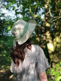 "The 'Emmy' hat, one of my bestsellers.   Made from a beautiful green fern print linen,with an olive green linen contrast.   the shape and silhouette of the 'Emmy' hat is very flattering, offering good facial coverage from the suns rays, with a linen tie feature, which if needed also works to slightly tighten the hat size, for those windy days.  The brim width is 9cm at the front scooping to 7cm at the back, with a cut away collar back to offer freedom of movement,  to help stop the hat catching Linen Hat With Short Brim, Linen Short Brim Hat, Summer Linen Fedora Hat, Vacation Linen Hat With Short Brim, Summer Linen Hat With Short Brim, Summer Linen Hat With Curved Brim, Linen Fedora Hat For Spring, Linen Sun Hat With Curved Brim For Vacation, Natural Linen Hats For Vacation