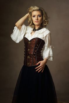 elegant blond woman wearing a blouse, a steampunk corset and a long skirt Steampunk Woman, Steampunk Victorian, Steampunk Corset, Victorian Women, Steampunk Fashion, Victorian Style, Victorian Fashion, First Look, Free Stock Photos