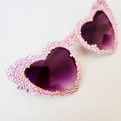 Look like a bad a$$ in these amazing floral heart shaped sunglasses. These glasses are perfect for the person that loves pink and flowers to wear at a garden party, bachelorette party, garden wedding or bridal shower. These will look stunning in engagement photos or wedding photos and are made with the vintage style pink rhinestones Not getting married? These are perfect to complete your music festival or concert look. Pair with your favorite summer dress. Each pair is hand embellished with the Cute Party Sunglasses With Heart Print, Fun Party Sunglasses With Heart Print, Heart-shaped Sunglasses With Heart Print For Party, Heart-shaped Party Sunglasses With Heart Print, Fun Heart Print Party Sunglasses, Cute Heart Print Sunglasses For Party, Cute Heart Shaped Sunglasses For Spring, Cute Heart-shaped Sunglasses For Spring, Cute Heart-shaped Spring Sunglasses