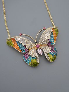 "Vintage Jewelry - Statement Necklace - Vintage Inspired Necklace - Butterfly Necklace - Gold Necklace - Colorful Necklace Crystal Necklace This is a gorgeous vintage inspired butterfly necklace! Encrusted with sparkling crystals in pink, and purple with the wings painted with a myriad of colors with enamel. The pendant hangs from a gold plated chain. A stunning statement piece. Chloe says, \"Wear it and feel fabulous!\" You can choose the chain length you would like at checkout.. The pendant is Elegant Multicolor Jewelry With Butterfly Charm, Elegant Multicolor Butterfly Charm Jewelry, Elegant Multicolor Butterfly Necklace As A Gift, Elegant Multicolor Butterfly Necklace As Gift, Elegant Multicolor Butterfly Necklace Gift, Multicolor Butterfly Charm Jewelry, Multicolor Butterfly Charm Necklaces, Multicolor Butterfly Jewelry For Gifts, Handmade Multicolor Butterfly Necklace For Gift