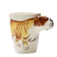 a coffee cup with a dog painted on it