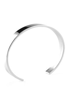 Enhance a variety of ensembles with this handsome sterling silver cuff bracelet. 1/4" width; 6 1/4" approx inner circumference (size Small) Sterling silver Made in France Modern White Gold Bangle With Polished Finish, Modern Sterling Silver Cuff Bracelet With Polished Finish, Modern White Gold Cuff Bracelet With Shiny Finish, Modern Polished Sterling Silver Bracelet, Modern Shiny Cuff Bangle Bracelet, Modern Cuff Bangle With Polished Finish, Modern Polished Cuff Bangle, Minimalist White Gold Cuff Bracelet For Formal Occasions, Modern Adjustable Cuff Bracelet With Shiny Finish