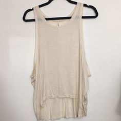 Cream Muscle Tee Never Worn Perfect Condition Beige T-shirt For Summer Day Out, Beige Summer T-shirt For Day Out, Summer Beige Crew Neck Top, Cream Crew Neck Top For Day Out, Beige Crew Neck Tank Top For Summer, White Tank Tops For Summer, Beige T-shirt For Beach, Summer Season, Beige Crew Neck Top For Beach, Casual Cream Tops For Layering