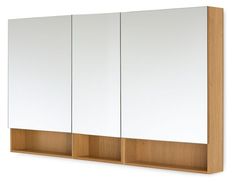 a wooden cabinet with three mirrors on it