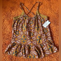 Has Been Stored And Handled. Pit To Pit About 16”. Top To Bottom Length About 27”. Check Condition And Sizing; No Returns. Brown Printed Summer Tops, Patterned Ruffle Tops For Vacation, Patterned Ruffled Tops For Vacation, Summer Brown Cami Top, Bohemian Printed Cami Top, Summer Brown Tops With Floral Print, Fitted Brown Tops For Vacation, Fitted Patterned Top For Vacation, Patterned Fitted Tops With Ruffles