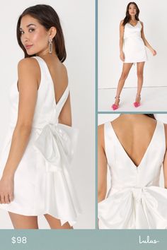 The Lulus Charming Celebration White Taffeta Bow Mini Dress has a whole lot of glamour that is sure to make you the talk of any social soiree this season! Sleek and structured woven taffeta shapes this iconic dress that features wide straps that support a princess-seamed bodice and a V-neck (and back). The fitted waist tops a figure-skimming skirt that falls to a flirty mini hem. Turn around to reveal an eye-catching oversized bow detail, that secures via snap closures for easy on-and-off! Hidde Elegant Taffeta Spring Dress, Elegant Spring Taffeta Dress, Feminine Taffeta Wedding Dress, Elegant Taffeta Mini Dress For Wedding, Spring Prom Dress With Satin Bow, Chic Dresses With Satin Bow For Prom Season, Chic Prom Mini Dress With Satin Bow, Spring Wedding Mini Dress With Satin Bow, Satin Mini Dress With Satin Bow For Prom