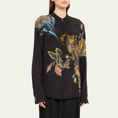 Jason Wu Collection blouse in forest floral print Stand-up collar; concealed button placket Long sleeves; button cuffs Oversized fit Back yoke; box pleat Silk Dry clean Imported Designer Floral Print Button-up Blouse, Designer Button-up Blouse With Floral Print, Designer Floral Print Shirt For Work, Designer Floral Print Workwear Shirt, Designer Floral Print Workwear Blouse, Designer Floral Print Blouse For Work, Designer Floral Print Tops For Work, Designer Printed Blouse For Work, Fit Back