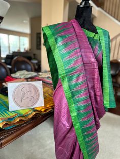 A beautiful raw Tussar silk saree in purple and green. Odisha silk with temple border, comes with a stitched blouse Purple Raw Silk Pre-draped Saree With Cutdana, Festive Purple Tussar Silk Pre-draped Saree, Purple Handloom Chanderi Pre-draped Saree, Purple Cotton Silk Handloom Saree, Purple Handloom Cotton Silk Saree, Purple Bollywood Style Pre-draped Raw Silk Saree, Traditional Purple Slub Silk Saree, Purple Raw Silk Handloom Saree, Purple Slub Silk Saree With Traditional Drape