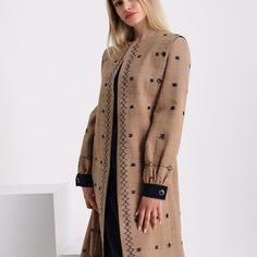 Description: Woven Outerwear Long Wool overcoat, Wool Design Coat,Wool hand woven coat,women's Wool Hand Woven Beige Coats, . . Hello ETSY family, Welcome to my store I would like to mention to you about our country's 100% wool, minimalist, geographically registered and almost a work of art: vintage ehram hand-woven fabric whose history is unknown and whose roots date back to centuries and which was inherited from our grandmothers' chests. On behalf of Maşlah Design, I am happy to present my wid Fitted Long Sleeve Outerwear With Set-in Sleeves, Tailored Beige Wool Coat With Long Sleeves, Elegant Outerwear With Set-in Sleeves, Embroidered Winter Workwear Outerwear, Embroidered Outerwear For Work In Fall, Embroidered Fall Outerwear For Work, Fall Embroidered Outerwear For Work, Fall Embroidered Workwear Outerwear, Tailored Embroidered Outerwear For Fall