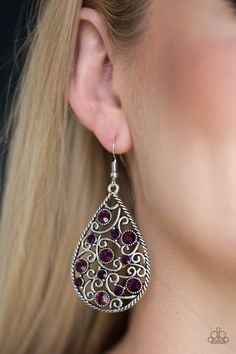 Varying in size, glittery purple rhinestones are sprinkled along a silver filigree backdrop for a whimsical look. Earring attaches to a standard fishhook fitting.

Sold as one pair of earrings. Bling Earrings, Box Accessories, Purple Earrings, Filigree Earrings, Purple Rhinestone, Paparazzi Accessories, Seed Bead Necklace, Paparazzi Jewelry, Silver Filigree