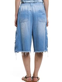 This is a casual and comfortable bermuda pants that are made out of high quality cotton 100% denim fabric. With design detail of relaxed wide silhouette, bio and sand washed denim fabric, and elastic waistband, it gives a comfortable and trendy mood.- Short bermuda silhouette- Relaxed wide silhouette- Bio and sand washed fabric- Rough damaged detail on the hem- Elastic waistband Washed Blue Cotton Pants With Frayed Hem, Baggy Straight Leg Spring Shorts, Baggy Straight Leg Shorts For Spring, Light Wash Cotton Pants With Frayed Hem, Wide Leg Washed Cotton Shorts, Summer Medium Wash Washed Pants, Spring Medium Wash Knee-length Jeans Shorts, Spring Recycled Denim Bottoms With Frayed Hem, Casual Baggy Bottoms With Frayed Hem