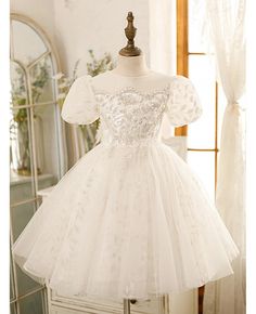 Buy couture sequined embroidery ballgown tulle flower girl dress with bubble sleeves at wholesale price online. Free shipping and pro custom service since 2009. Tulle Princess Dress With Floral Applique For First Communion, First Communion Princess Dress With Floral Applique, Confirmation Ball Gown With Fitted Bodice In Tulle, Confirmation Ball Gown With Fitted Bodice, Tulle Ball Gown With Fitted Bodice For Confirmation, Fitted Tulle Princess Dress For Confirmation, First Communion Dresses With Floral Applique Tulle, Short Sleeve Tulle Dress With Floral Applique, Fitted Tulle First Communion Dress With Floral Applique