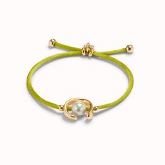 18k Gold-Plated Lime Mouse Tail Thread Bracelet With Shell Pearl Accessory. Made In Spain With A 100% Handmade Process. When It Comes To Bracelets, More Is More! For You Who Love To Mix Colors, Be Wild And Innovative With Your Looks; This Collection Is Made For You And You Know It. Adjustable Yellow Gold-plated Pearl Bracelet, Yellow Gold Plated Jubilee Pearl Bracelet, Elegant Adjustable Gold Bracelet With Gold Clasp, Adjustable Gold-plated Pearl Bracelet For Formal Occasions, Adjustable Gold Pearl Bracelet In Modern Style, Adjustable Gold Plated Pearl Bracelet For Formal Occasions, Adjustable White Gold-plated Bracelet, Modern Gold Pearl Bracelet As Gift, Modern Yellow Gold Pearl Bracelet For Gift