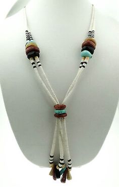 The necklace is stranded with a cloth like beading material. The necklace is in good condition with the cording appearing to be strong and not broken in any sections. Total weight is 142 grams. Stones: Turquoise, Agate, & Shell. Southwestern Style White Beaded Necklace With Large Beads, Southwestern Turquoise Necklace With Large Adjustable Beads, Hand-strung White Southwestern Necklace, White Hand-strung Southwestern Necklace, White Southwestern Hand-strung Necklaces, Southwestern Style Hand-strung White Necklaces, Beaded Shell, The Necklace, Agate Necklace