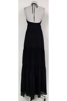 Flirty maxi dress from DVF. Designed with a daring open back and all over pleating on the fabric. A key hole front also adds a chic touch. Style it with wedges and chic sunnies for a vacation ready look that will wow. Size 4 100% polyester Concealed side zipper Lined Halter neckline w/ ties Open back Pleats on fabric Tie at waist Maxi length Bust 29" Waist 26" Shoulder to hem 60" Pleated Floor-length Maxi Dress For Party, Formal Ruched Pleated Maxi Dress, Maxi Length Pleated Dress For Date Night, Pleated Floor-length Maxi Dress For Date Night, Chic Maxi Dress With Tie Back For Night Out, Floor-length Pleated Dress For Evening With Pleated Back, Party Maxi Dress With Pleated Back, Floor-length Pleated Dress For Evening, Chic Tie Back Maxi Dress For Night Out