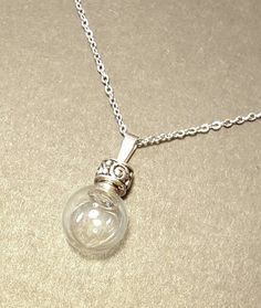 Hey, I found this really awesome Etsy listing at https://www.etsy.com/listing/264261106/crystal-ball-necklace-fillable-blown Silver Glass Necklace Keepsake, Silver Glass Necklace For Keepsake, Clear Glass Jewelry For Healing, Clear Glass Healing Jewelry, Silver Glass Jewelry For Keepsake, Spiritual Clear Glass Necklaces, Spiritual Clear Round Pendant Necklace, Elegant Glass Necklace For Keepsake, Elegant Glass Keepsake Necklace