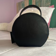 Nice Sleek Black Circle Bag With Gold Detailing. The Bag Is Leather. Perfect For Dinners Or Gatherings. A Lot Of Space Inside The Bag. Never Worn Trendy Shoulder Bag With Adjustable Strap For Night Out, Trendy Bag With Adjustable Strap And Round Handle, Everyday Black Satchel With Round Handle, Trendy Party Shoulder Bag With Round Handle, Black Trendy Satchel With Round Handle, Trendy Black Satchel With Round Handle, Chic Party Satchel With Adjustable Handle, Trendy Shoulder Bag With Detachable Handle For Night Out, Chic Black Satchel With Adjustable Handle