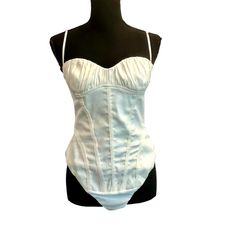 Zara White Ruched Sweetheart Spaghetti Strap Corset Bustier Bodysuit Sz M Nwot Elevate Your Style Game With Our Latest Addition To The Zara Collection - The Gorgeous White Ruched Sweetheart Bodysuit. Designed To Accentuate Your Curves And Provide A Flattering Fit, This Bodysuit Is A Must-Have For Any Fashion-Forward Individual. The Sweetheart Neckline Adds A Touch Of Femininity While The Spaghetti Straps Offer A Delicate And Elegant Look. Plus, The Corset Bustier Design Gives You That Coveted Ho Fitted Ruched Corset With Spaghetti Straps, Summer Underwire Corset With Built-in Bra, Feminine Fitted Camisole Corset, Summer Ruched Corset For Night Out, Sleeveless Ruched Summer Corset, Fitted Feminine Camisole Corset, Sleeveless Ruched Corset For Summer, Summer Cotton Corset With Built-in Bra, Fitted Corset With Boned Bodice And Spaghetti Straps