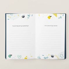 an open notebook with school supplies and writing on the pages, which are lined up