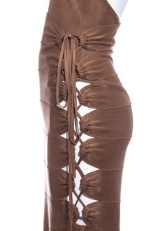 For Sale on 1stDibs - ▪ Azzedine Alaia copper bandage skirt and bodysuit ▪ 100% Acetate ▪ Eight connecting panels ▪ Skin bearing lace-up string fastening ▪ Halterneck bodysuit Brown Bottoms For Club Wear, Azzedine Alaia 90s, High Waist Brown Party Skirt, High Waist Brown Skirt For Party, Brown High Waist Party Skirt, Fitted Brown Bottoms For Party, Brown Stretch Party Skirt, Stretch Brown Skirt For Party, Brown Stretch Skirt For Party