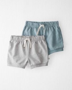 These shorts are made with certified organic cotton and covered elastic waistbands that are soft and comfortable for your little ones. In our signature neutral colors, this 2-pack is easy to mix-and-match and pass from sibling to sibling. Crafted in the purest organic fabrics and sustainable materials, Little Planet is a return to simplicity. Thoughtful essentials and timeless pieces to gift or to hold on to. Planet Clothing, Types Of Shorts, Free Jeans, Organic Fabrics, Toddler Sizes, Sustainable Materials, Shop Clothing, Grey Blue, Holiday Fashion