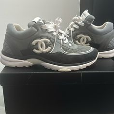 Hello Ladies, I Am Selling My Chanel Trainer Size 41 Women’s Would Be Considered A Size 10 In Women’s. That’s What I Am Great Condition. Only Worn About Two Times The Right Shoe In The Back Does Have Shoe Stain I Got Stepped On Pictured Attached But Other Than That They Are In Great Condition. They Are Gray With Dark Gray Mix. Made In Italy Yes, Come With Original Chanel Box Chanel Trainers, Shoes Chanel, Chanel Box, Hello Ladies, Chanel Shoes, Womens Shoes Sneakers, Dark Gray, Shoes Sneakers, In Italy