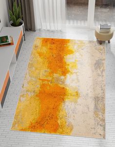 an orange and yellow area rug in a living room