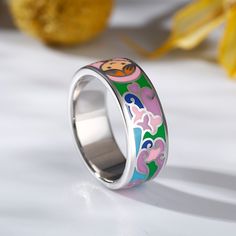 Bring abstract style and an array of colors to your hand, this silver enamel ring has a look all of its own. The cool silver finish is the perfect backdrop to the bold, bright pinks, blues, violet and greens of the enamel insets, giving you a 60’s style with a 21st century twist.Weight: 5.71 gMaterial: Plating Color: Multicolor Enamel Ring, Multicolor Enamel Ring For Gift, Multicolor Enamel Ring As Gift, Unique Multicolor Enamel Ring, 60’s Style, Enamel Ring, Silver Enamel, Abstract Styles, The Cool