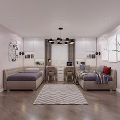 a bedroom with two beds and a desk