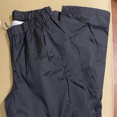 Columbia Black Windpants. No Tag But Never Worn. Adult Small. Drawstring And Elastic Waist. Black Full Length Bottoms For Outdoor, Waterproof Full Length Black Bottoms, Black Stretch Waterproof Bottoms, Black Outdoor Pants With Elastic Waistband, Black Stretch Bottoms For Outdoor, Columbia Pants, Mens Pants, Columbia, Elastic Waist