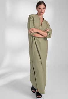 Back by popular demand, we've reworked our straight-fit, classic tunic! Made from super soft, upcycled cotton poplin, this light-weight tunic is a go-to for casual dressing. A flattering v-neck with pockets and side slits at the hem, this one is perfectly chic. Whether it's a backyard bbq, an errand run, or a trip to Morocco, this one fits the bill. Equally at home with sneakers or sandals, this tunic is in heavy rotation. And, since no virgin material was used to make it, look good, feel good a Cotton Tunic With Relaxed Fit For Daywear, Relaxed Fit Cotton Tunic For Daywear, Oversized Cotton Tunic, Summer Cotton Tunic For Work, Spring Cotton Tunic For Loungewear, Summer Workwear Cotton Tunic, Relaxed Fit Cotton Tunic For Spring, Oversized Cotton V-neck Tunic, Versatile Long Sleeve Tunic With Relaxed Fit