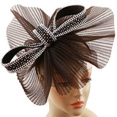 Introducing the Sunday Fascinator 272HB-BRN, a stunning accessory designed to elevate your Sunday attire with a touch of elegance and sophistication. Crafted with care, this fascinator boasts a fashionable brown color that exudes classic charm, making it a versatile addition to any outfit. The eye-catching bow design lies at the heart of this piece, with its expansive loops creating a dramatic visual effect. The loops are accentuated by a sprinkle of shimmering rhinestones, adding a dazzling spa Evening Headband Fascinator For Kentucky Derby, Kentucky Derby Evening Fascinator Headband, Kentucky Derby Evening Headband Fascinator, Chic Adjustable Fascinator For Party, Chic Fascinator Headband For Events, Chic Headband Fascinator For Events, Chic Mini Hat Headband For Party, Chic Hair Accessories For Wedding And Kentucky Derby, Chic Hair Accessories For Wedding At Kentucky Derby