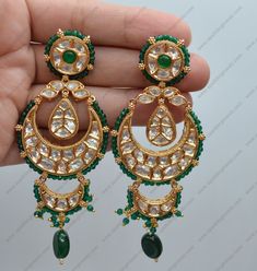 Premium quality Statement chandbali earrings beaded with crystal beads & tassels. Perfect for a sangeet or wedding wear. Earrings length: Approx. 3.5" Earrings weight: 18grms each earring Push-Back Closure. Antique Gold Plated on high-quality brass as the base metal In-stock & ready-to-ship Color may vary slightly due to light condition & photography. Jewelry Care: Keep away from moisture. Allow perfumes and lotion to dry before wearing. Store in jewelry pouch. Clean only with soft lint free clo