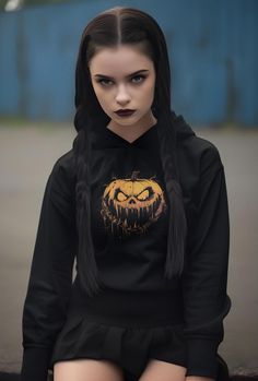 Transform your Halloween wardrobe with the "Dripping Pumpkin Horror" hoodie, a striking piece of apparel designed for Halloween enthusiasts and lovers of all things spooky. Perfect for trick-or-treating, Halloween parties, or simply embracing the eerie season, this hoodie adds a bold, frightful flair to your outfit. The vivid, dripping pumpkin design captures the essence of Halloween's spookiest vibes. Whether you're gearing up for a haunted night or searching for a unique gift, this hoodie is a Punk Halloween Hoodie Sweatshirt, Black Halloween Cosplay Hoodie, Black Halloween Sweatshirt For Alternative Fashion, Black Hoodie For Halloween Cosplay, Black Sweatshirt For Halloween Alternative Fashion, Halloween Emo Hoodie For Streetwear, Halloween Cosplay Hoodie With Drawstring Hood, Halloween Cosplay Hoodie, Emo Halloween Hoodie For Streetwear