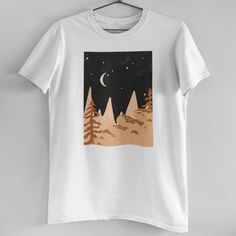 Midnight Forest Crescent Moon Stars Tee Brand New! Our In House T-Shirts Are High Quality And Printed On Demand. This Tee Features White 100% Cotton, Relaxed Boyfriend Fit, And Print Of Neutral Toned Nighttime Forest With Trees And Mountains. Size S-Xl Available (Model Is Wearing A Size M) Search Tags: Dusk Summer Natural Desert Boho Bohemian Vintage Retro Aesthetic Natural Art Nighttime Forest, Dusk Summer, Midnight Forest, Vintage Retro Aesthetic, Fall Tee Shirts, Desert Boho, Bible Verse Tees, Aesthetic Natural, Maroon Shorts