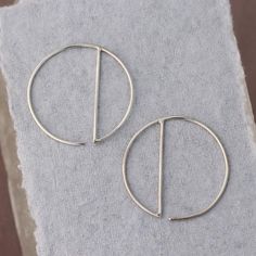 • Sterling Silver Geometric Hoop Earrings -- silver circles with a vertical dividing line, super minimalist and easy to wear• READY TO SHIP • Just over one inch long and wide Minimalist Hypoallergenic Open Circle Earrings, Minimalist Small Hoop Threader Earrings, Minimalist Pierced Open Circle Earrings, Minimalist Round Linear Earrings For Everyday, Minimalist Open Circle Pierced Earrings, Minimalist Diamond Hoop Earrings, Minimalist Hoop Threader Earrings, Nickel Free Minimalist Circle Earrings, Minimalist Nickel-free Hoop Earrings