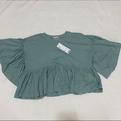 Nwt! Teal Balloon Sleeve- Short Sleeve Feel Free To Make An Offer! Urban Outfitters Summer Tops Relaxed Fit, Urban Outfitters Relaxed Fit Summer Tops, Green Urban Outfitters Top For Day Out, Urban Outfitters Green Top For Day Out, Casual Ruffled Cropped Tops, Casual Cropped Ruffle Tops, Spring Solid Color Tops From Urban Outfitters, Urban Outfitters Solid Tops For Spring, Green Cropped Top For Brunch