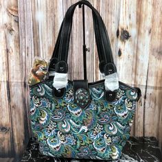 Made Of Cloth Like, Floral Print, Material, This Handbag Has: Turquoise Stone Concho On Flap With Magnetic Button Closure Top Zipper Closure Inside Of Bag Include A Zippered Pocket And 2 Open Pockets Metal Feet On The Bottom For Protection And Stability Double Flat Strap 14.5" X 5" X 11" (Drop 10.5") Tan Bags With Magnetic Closure For Everyday Use, Double Handle Hobo Bag With Snap Closure For Shopping, Casual Bags With Snap Closure For Errands, Multicolor Bag With Magnetic Closure For Daily Use, Multicolor Shoulder Bag With Magnetic Closure For Everyday Use, Tote Hobo Bag With Snap Closure For Errands, Hobo Tote Bag With Snap Closure For Errands, Tote Style Hobo Bag With Snap Closure For Errands, Casual Hobo Bag With Snap Closure For Errands