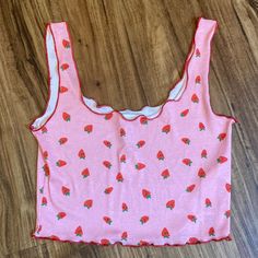 New Topshop Cropped Tank Is Pink With Red Lettuce Edges And A Strawberry Pattern. Size Small. Lightweight 97% Polyester 3% Elastane For Stretchy Comfortable Fit Approx 13.5” Pit To Pit Unstretched And 14.5” Shoulder To Hem Cute Fitted Tank Top For Spring, Cute Sleeveless Top With Strawberry Print, Red Sleeveless Top With Strawberry Print, Cute Sleeveless Strawberry Print Top, Sleeveless Red Top With Strawberry Print, Cute Fitted Crop Top Tank, Cute Stretch Sleeveless Tops, Red Strawberry Print Top For Summer, Casual Sleeveless Top With Strawberry Print