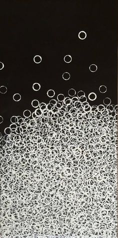 an abstract painting with black and white circles in the air, on a black background