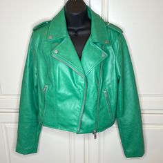 Nwt An Abbreviated Silhouette Paired With Faux Leather Updates A Classic Moto For Today's Hot Looks. Sleve Length: From Shoulder To Cuff - 25" And From Underarm To Cuff - 18" 18" Length (Size Small) Notched Lapels Zip Cuffs Lined 100% Polyester With Polyurethane Coating Machine Wash, Line Dry Green Zipper Closure Outerwear For Work, Green Outerwear With Zipper For Work, Trendy Green Leather Jacket With Zipper Closure, Trendy Green Leather Jacket With Zipper, Green Leather Jacket For Work In Fall, Trendy Green Leather Winter Jacket, Trendy Green Leather Jacket For Winter, Trendy Green Leather Jacket For Fall, Green Leather Jacket With Zipper For Fall